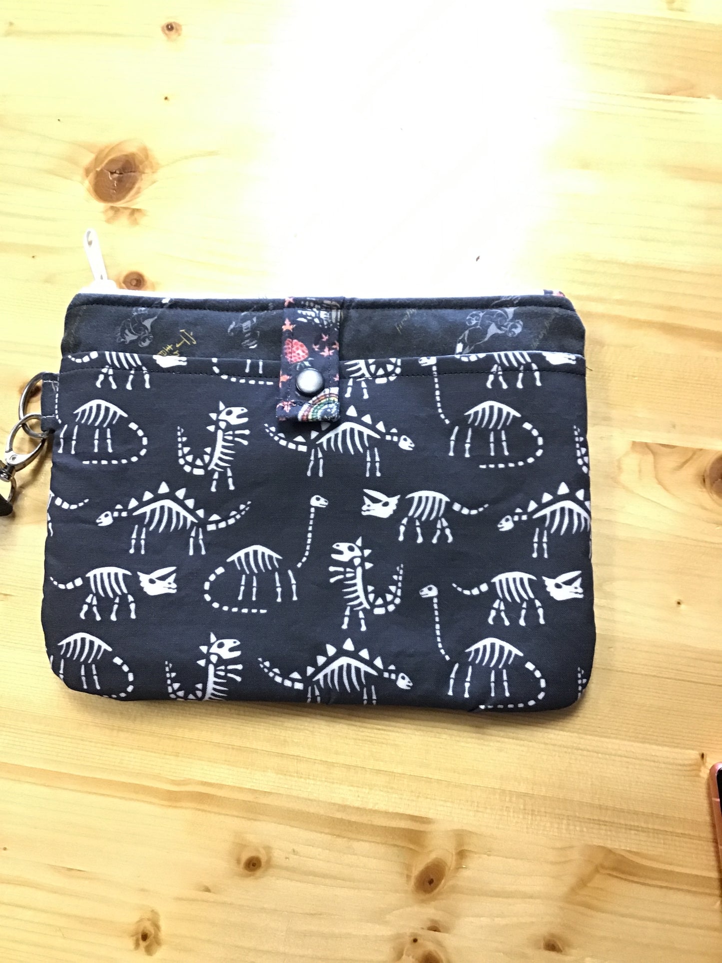 Dinosaur skeleton and firefly wallet